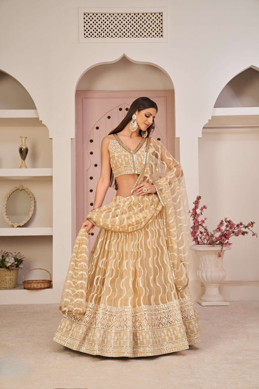 Beige Embroidered Net Lehenga Choli