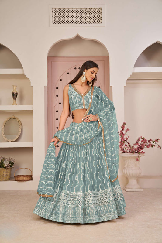 Teal Blue Embroidered Lehenga Choli in Net