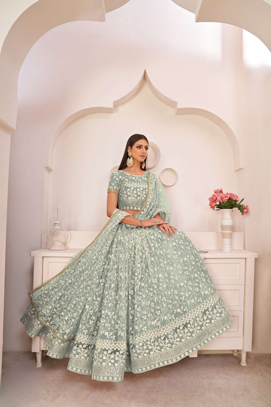 Turquoise Flared Lehenga Choli With Thread Embroidery
