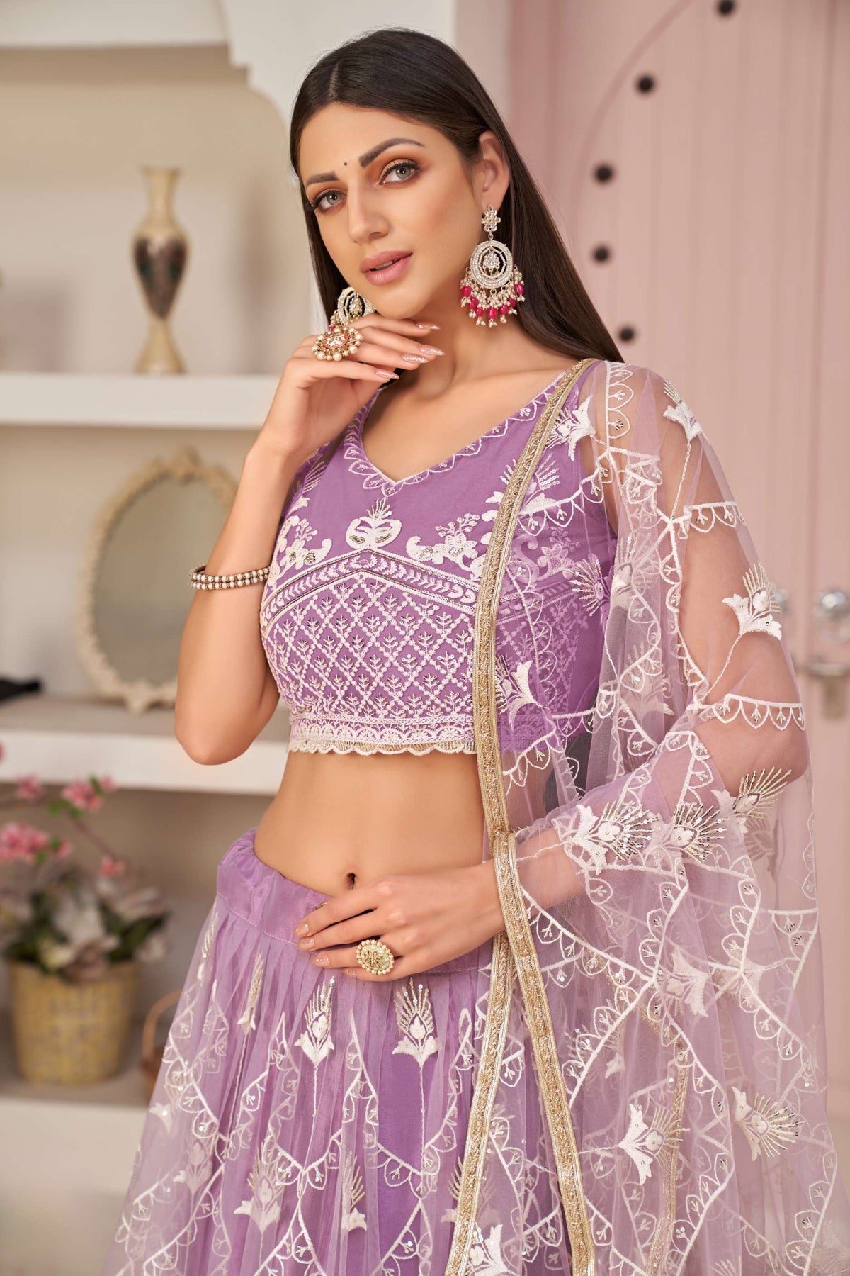Lavender Embroidered Lehenga & Choli in Net