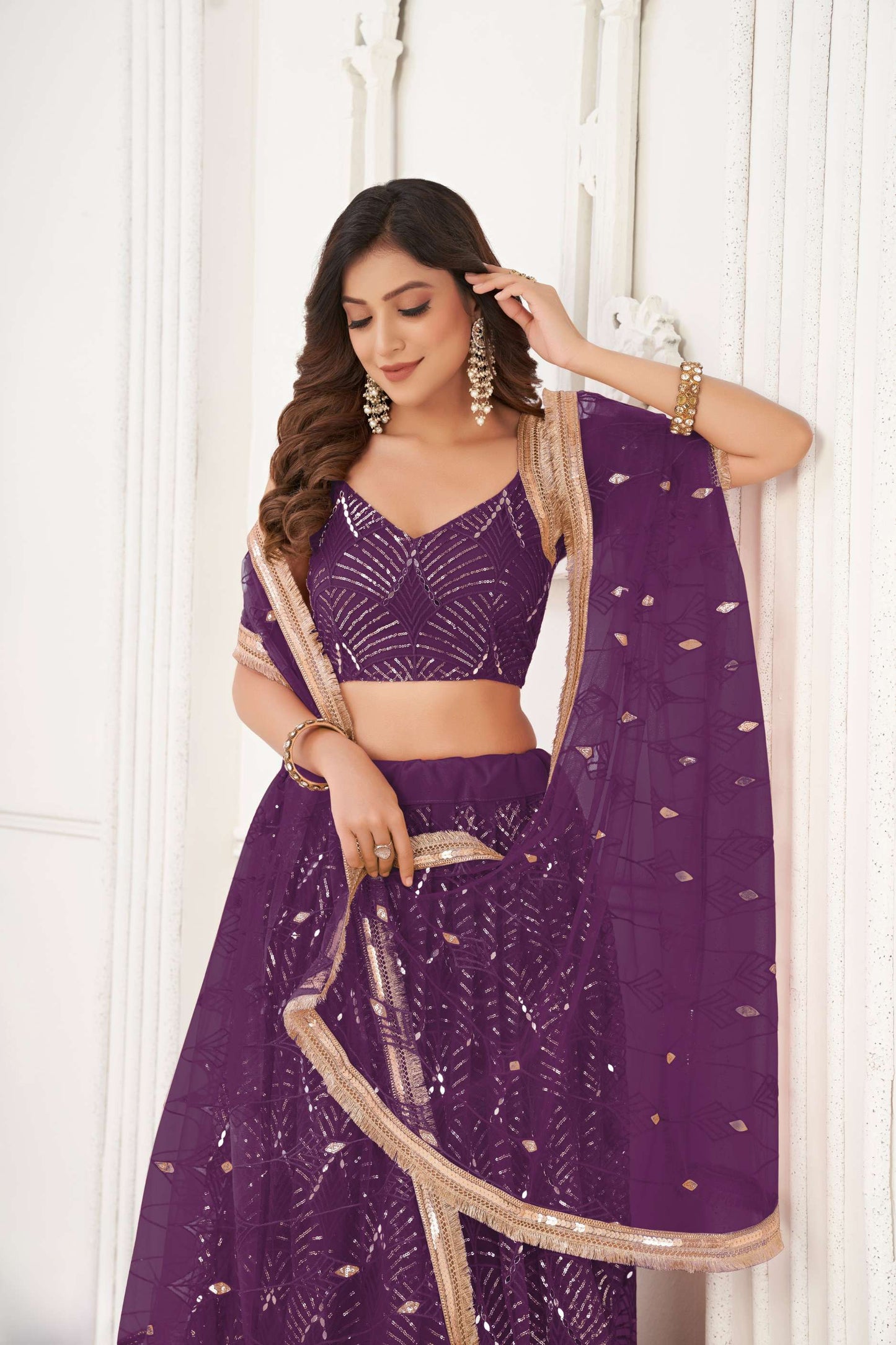 Purple Embroidered Lehenga Choli in Net