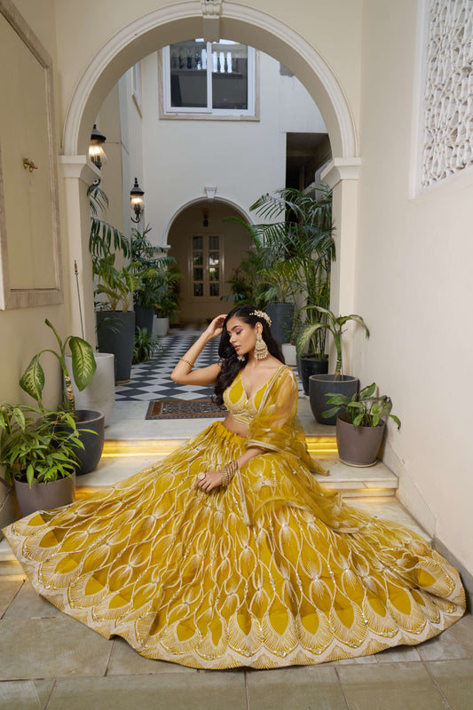 Yellow Thread Embroidery Lehenga Choli in Net