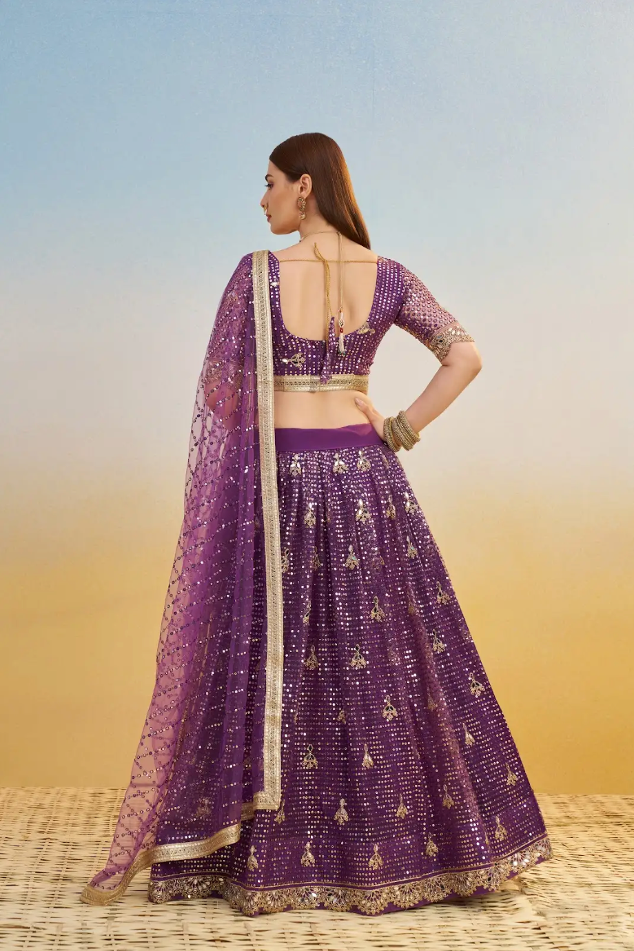 Purple Embroidered Lehenga Choli in Net
