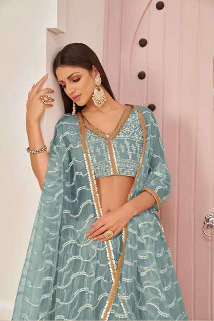 Teal Blue Embroidered Lehenga Choli in Net