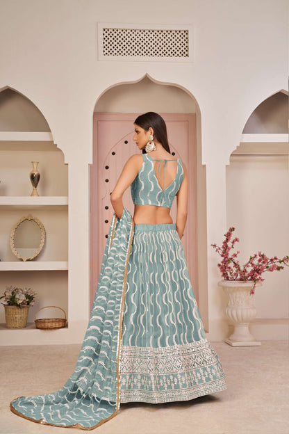 Teal Blue Embroidered Lehenga Choli in Net