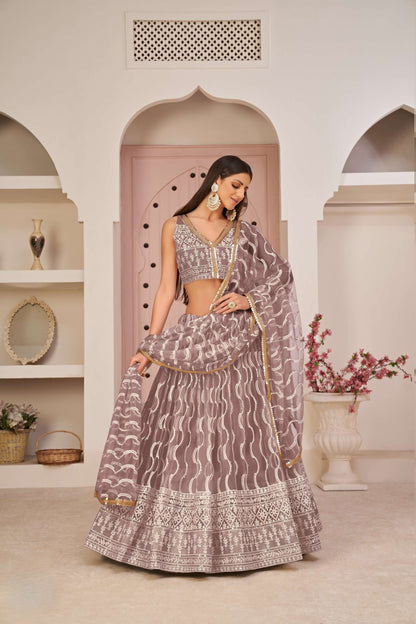 Pink Net Embroidered Lehenga Choli