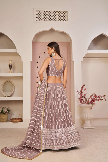 Pink Net Embroidered Lehenga Choli
