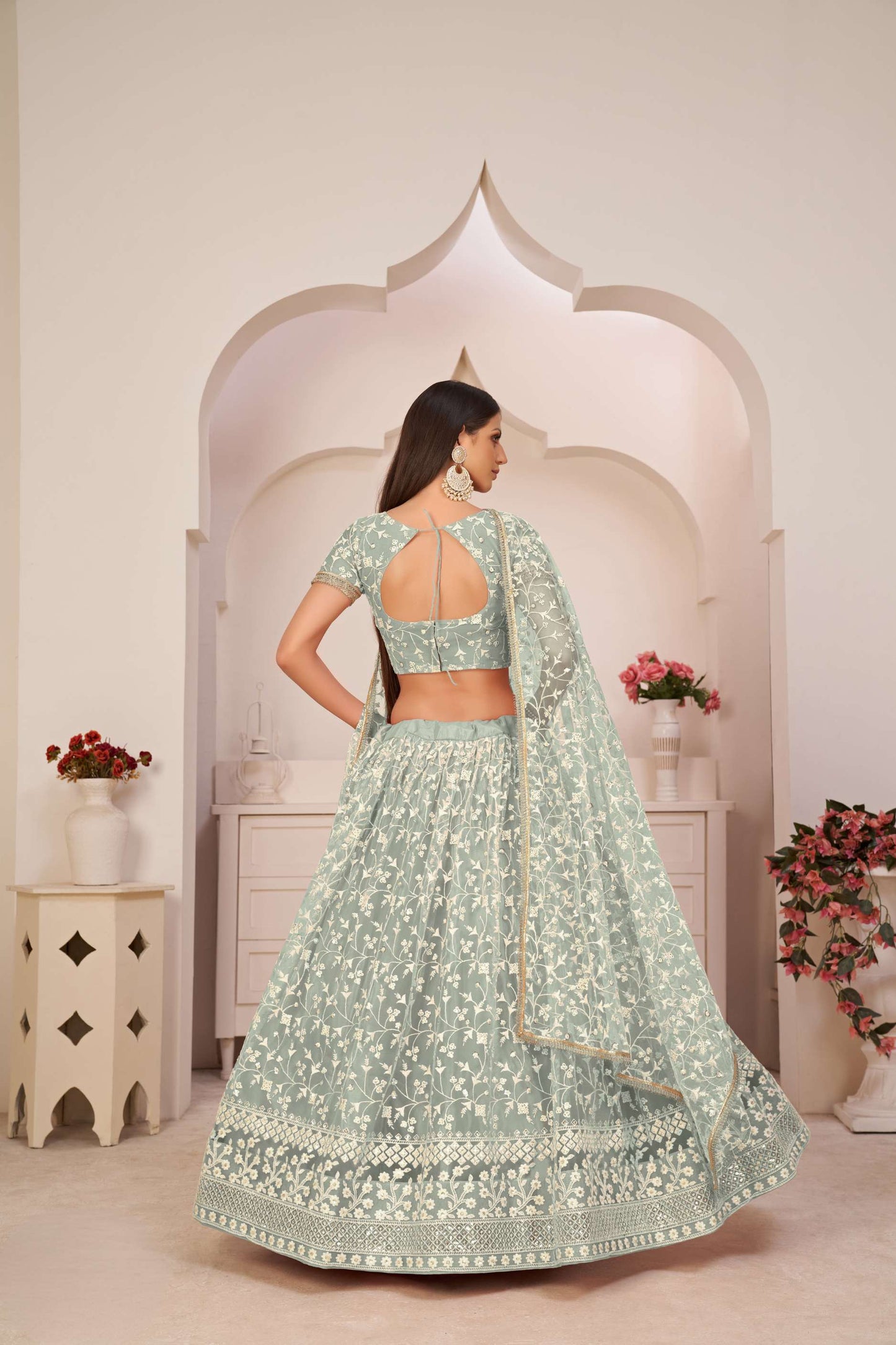 Turquoise Flared Lehenga Choli With Thread Embroidery