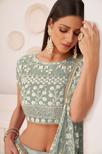 Turquoise Flared Lehenga Choli With Thread Embroidery