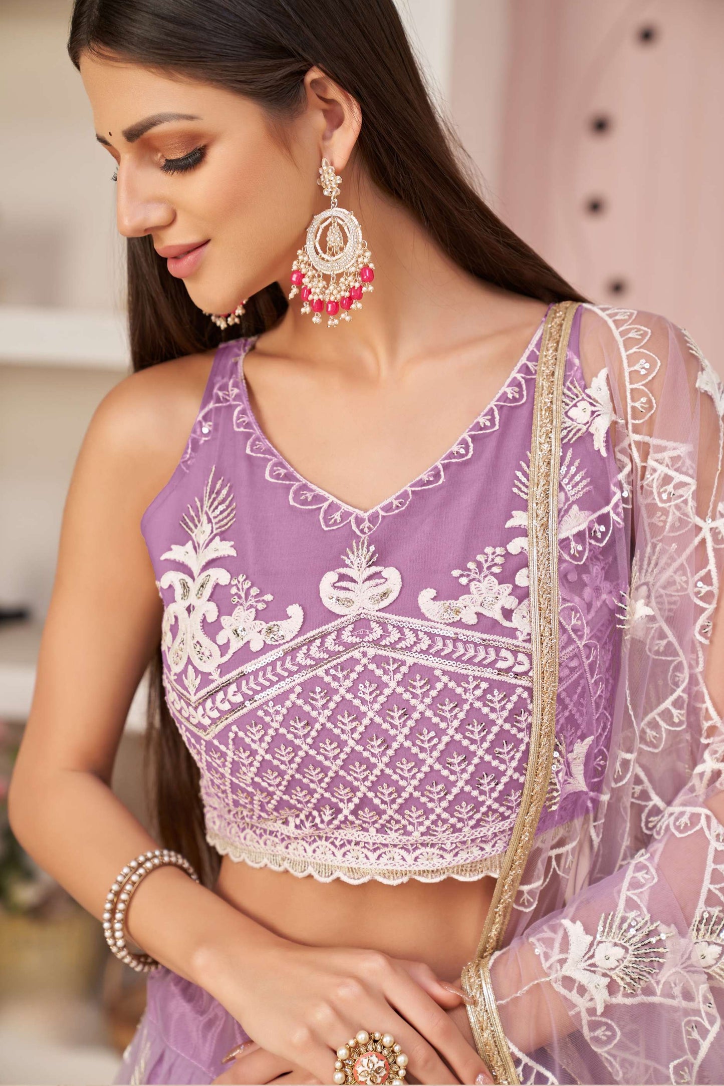 Lavender Embroidered Lehenga & Choli in Net
