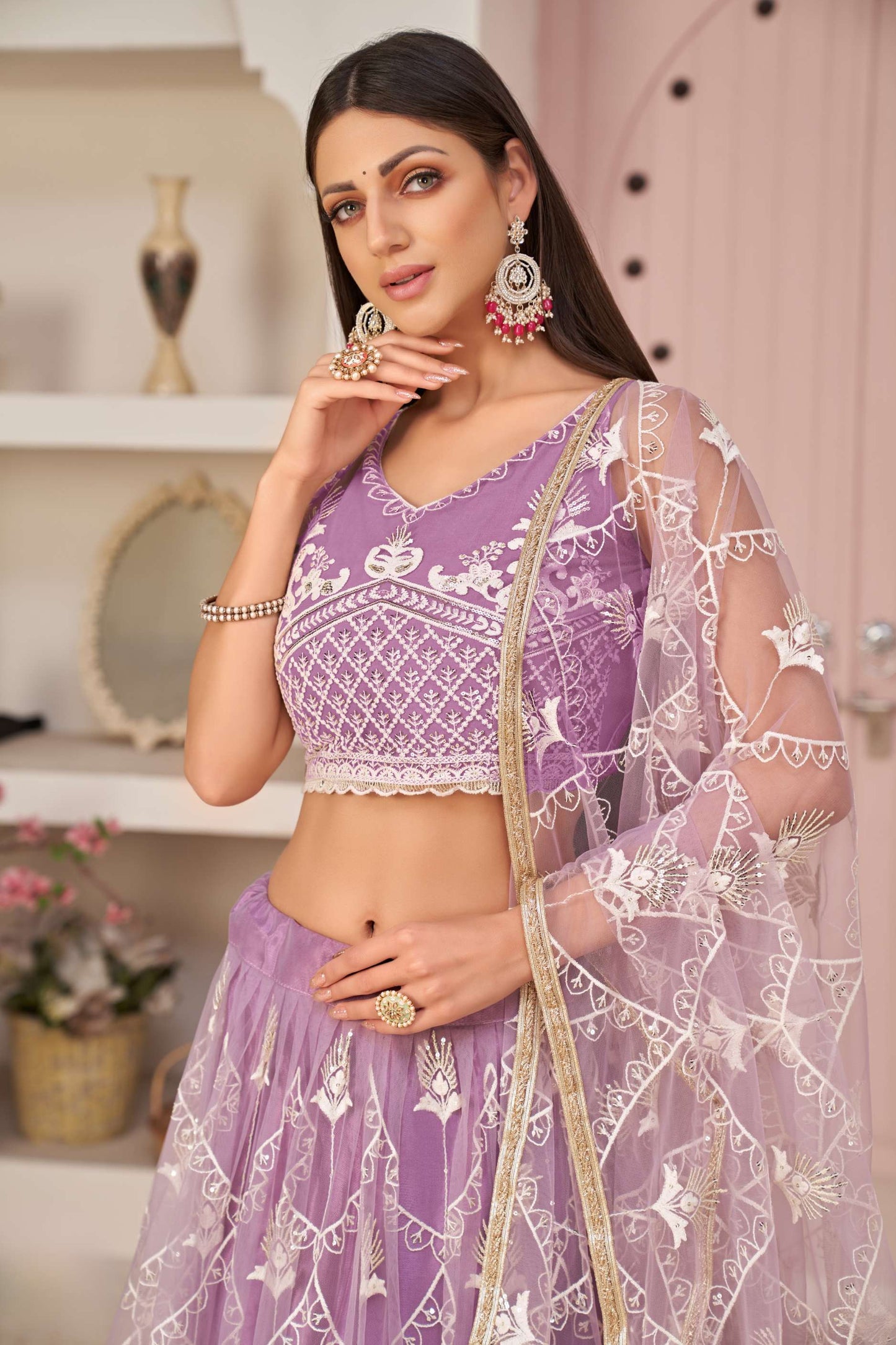 Lavender Embroidered Lehenga & Choli in Net