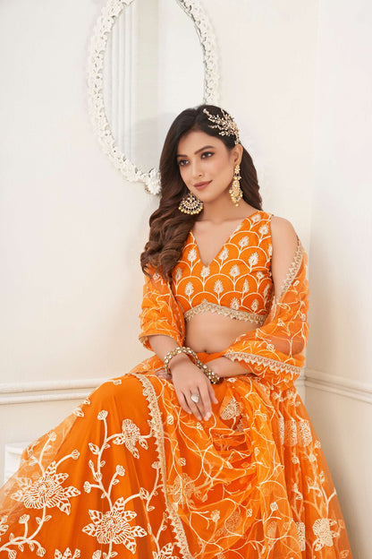 Orange Embroidered Lehenga Choli in Net