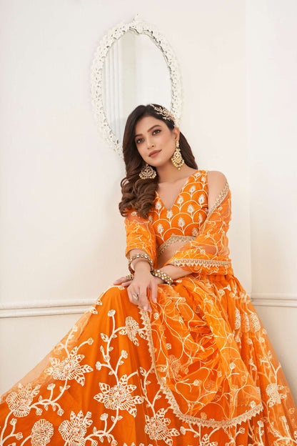 Orange Embroidered Lehenga Choli in Net
