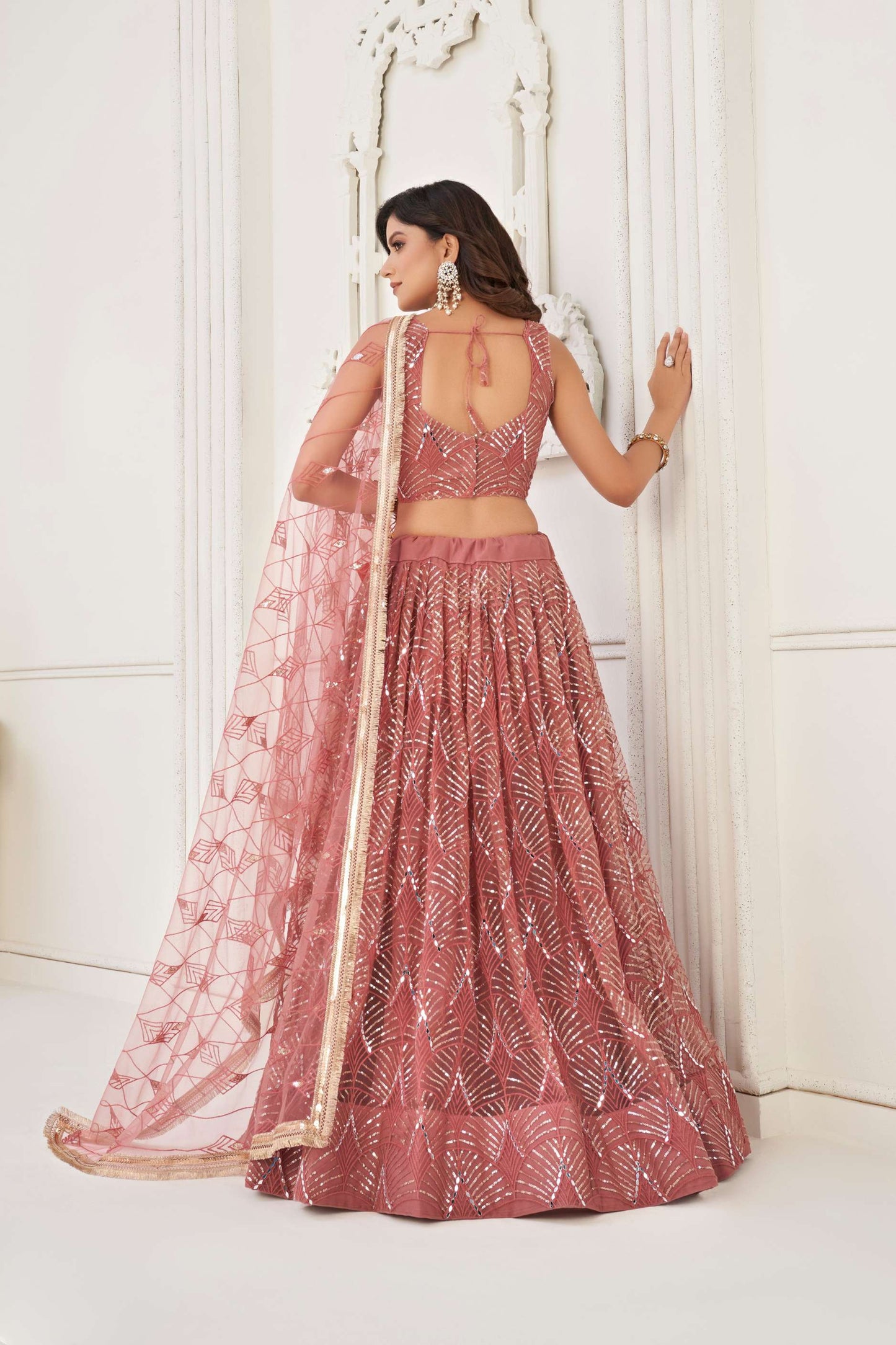 Dusty Pink Net Lehenga Choli in Sequins Embroidery