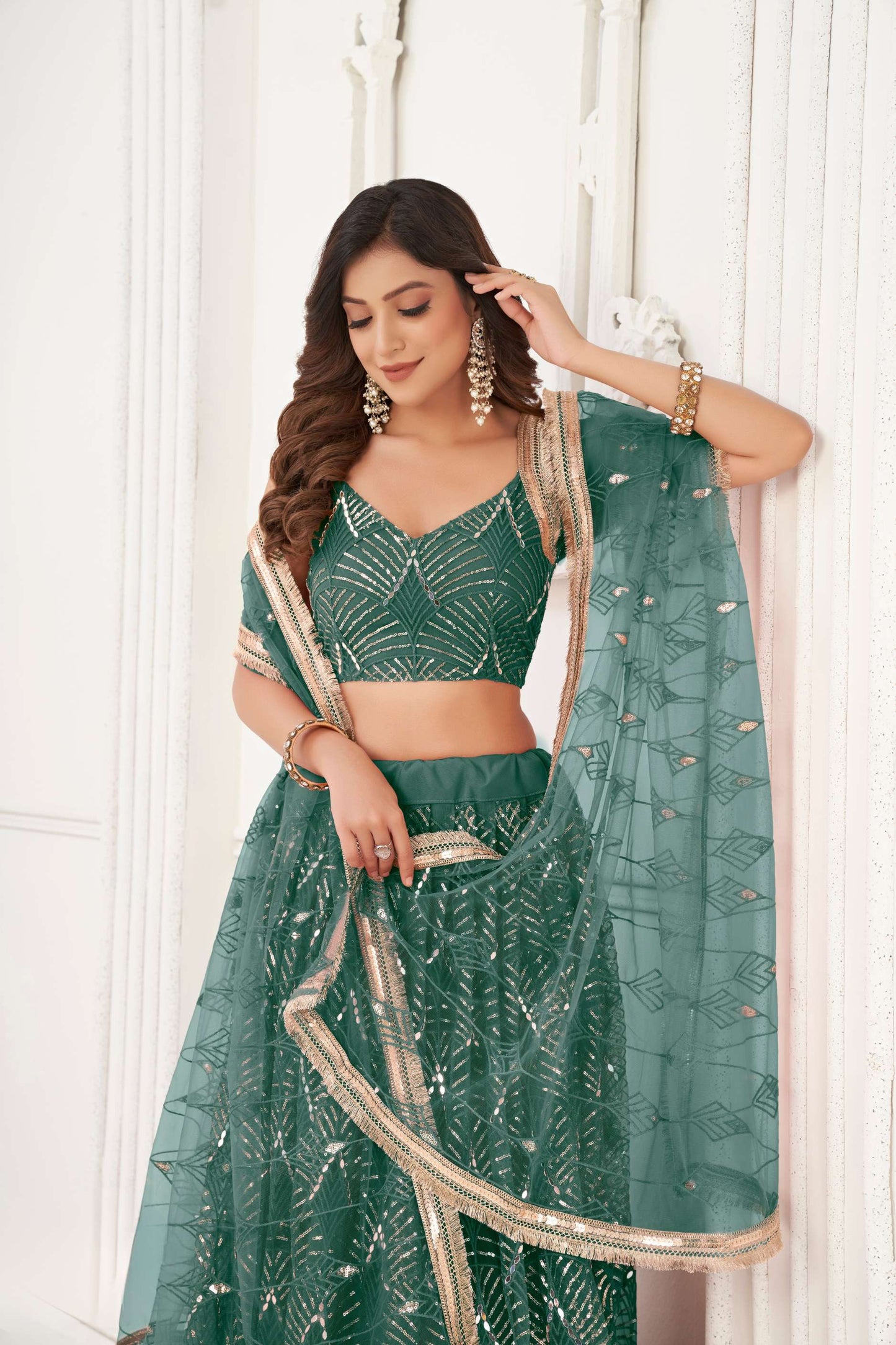 Bottle Green Sequins Work Lehenga Choli in Net