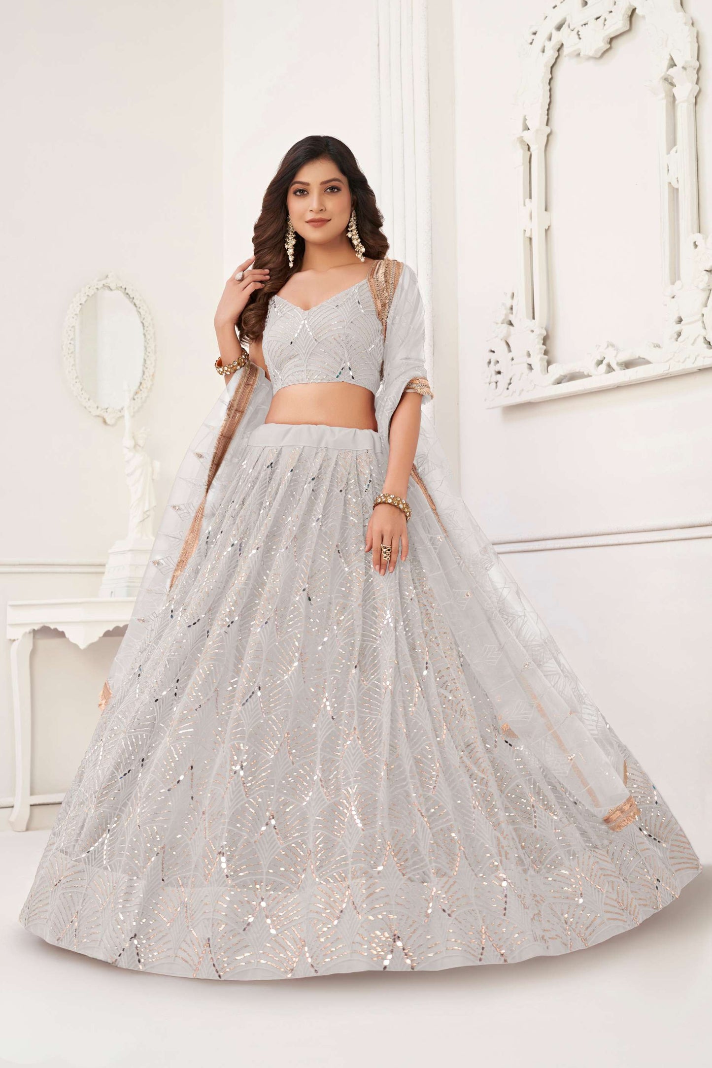 Off White Net Lehenga Choli In Sequins Work