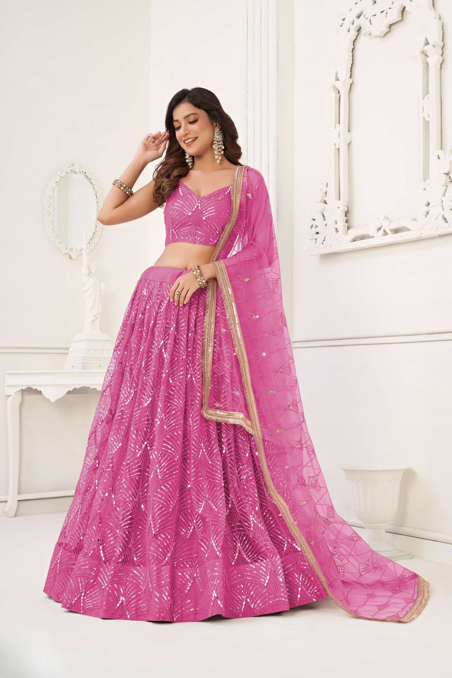 Salmon Pink Sequin Embellished Lehenga Choli in Net