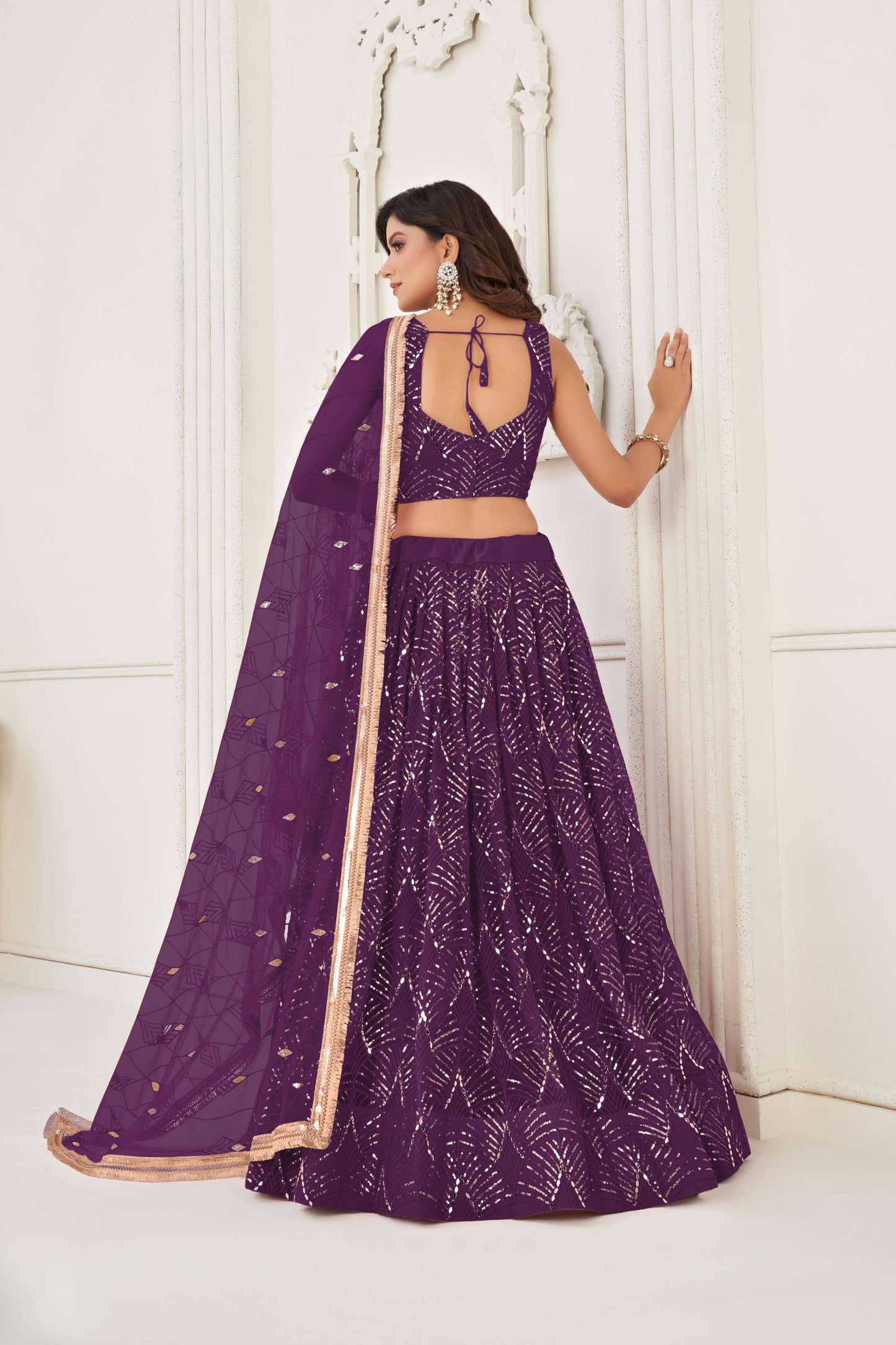 Purple Embroidered Lehenga Choli in Net