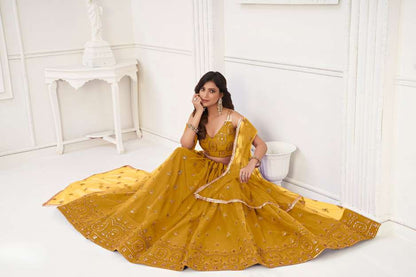 Yellow Embroidered Lehenga Choli in Net