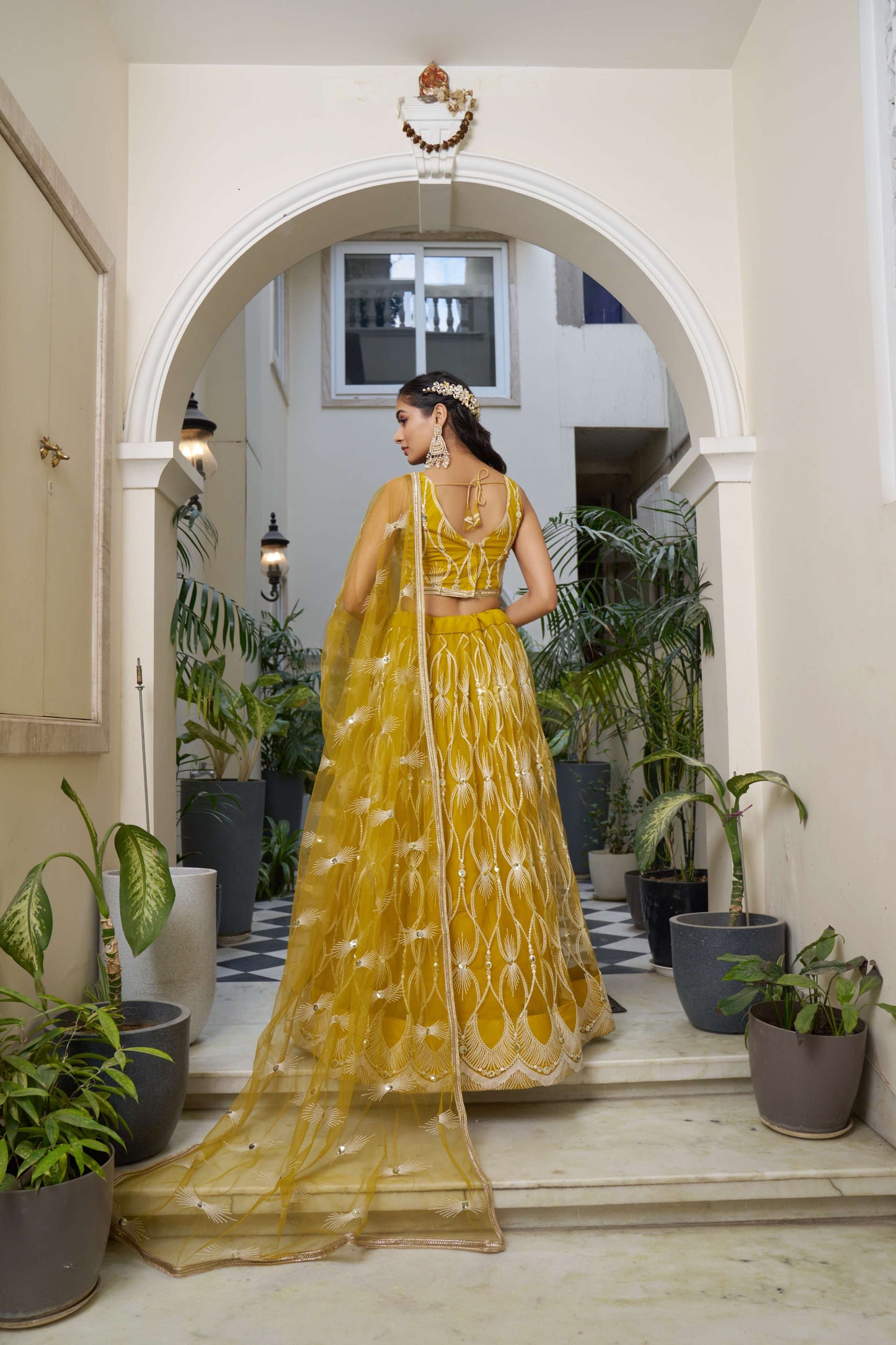 Yellow Thread Embroidery Lehenga Choli in Net