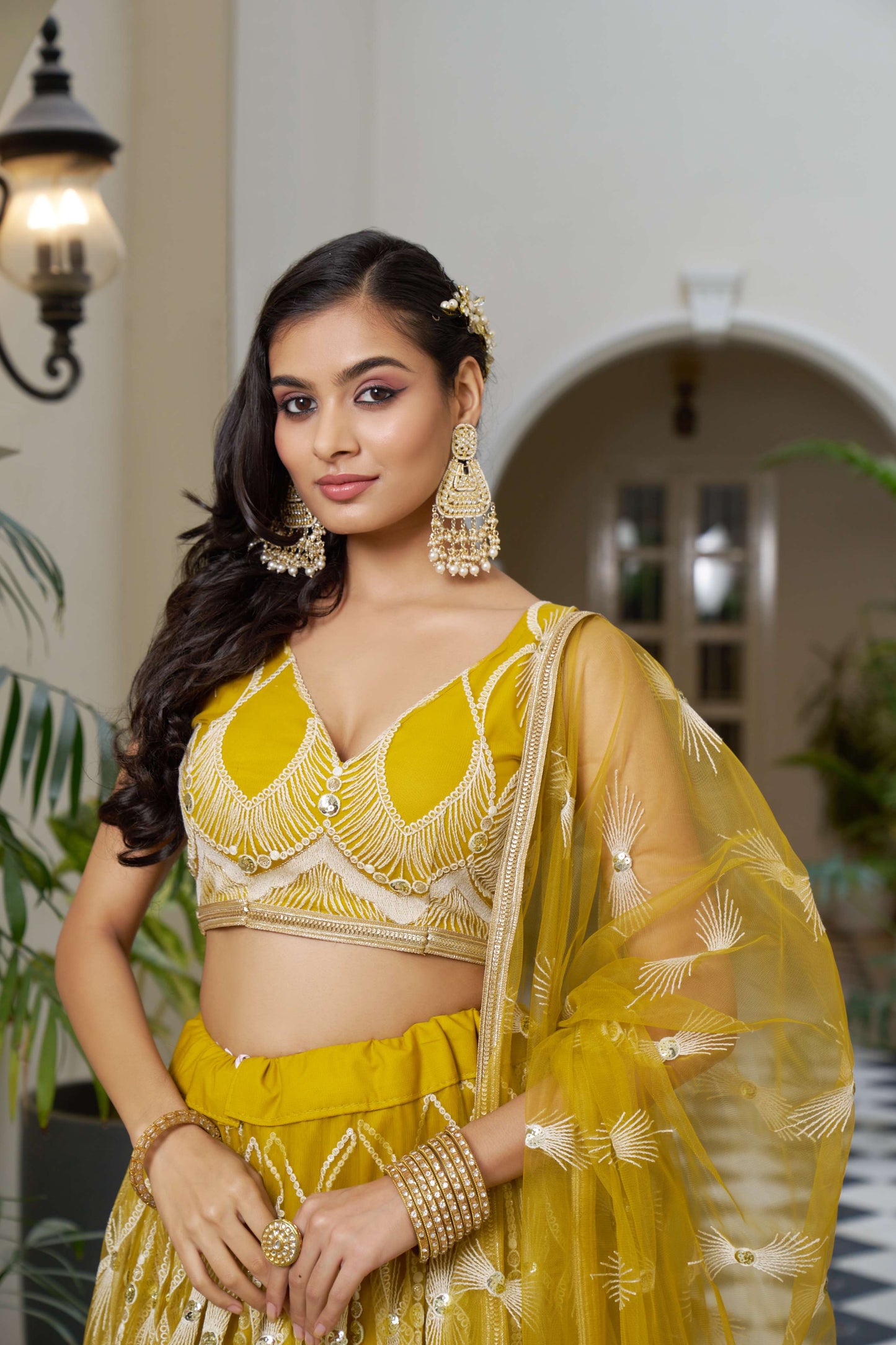 Yellow Thread Embroidery Lehenga Choli in Net