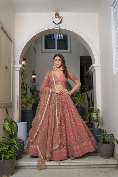 Rust Red Thread Embroidered Net Lehenga Choli
