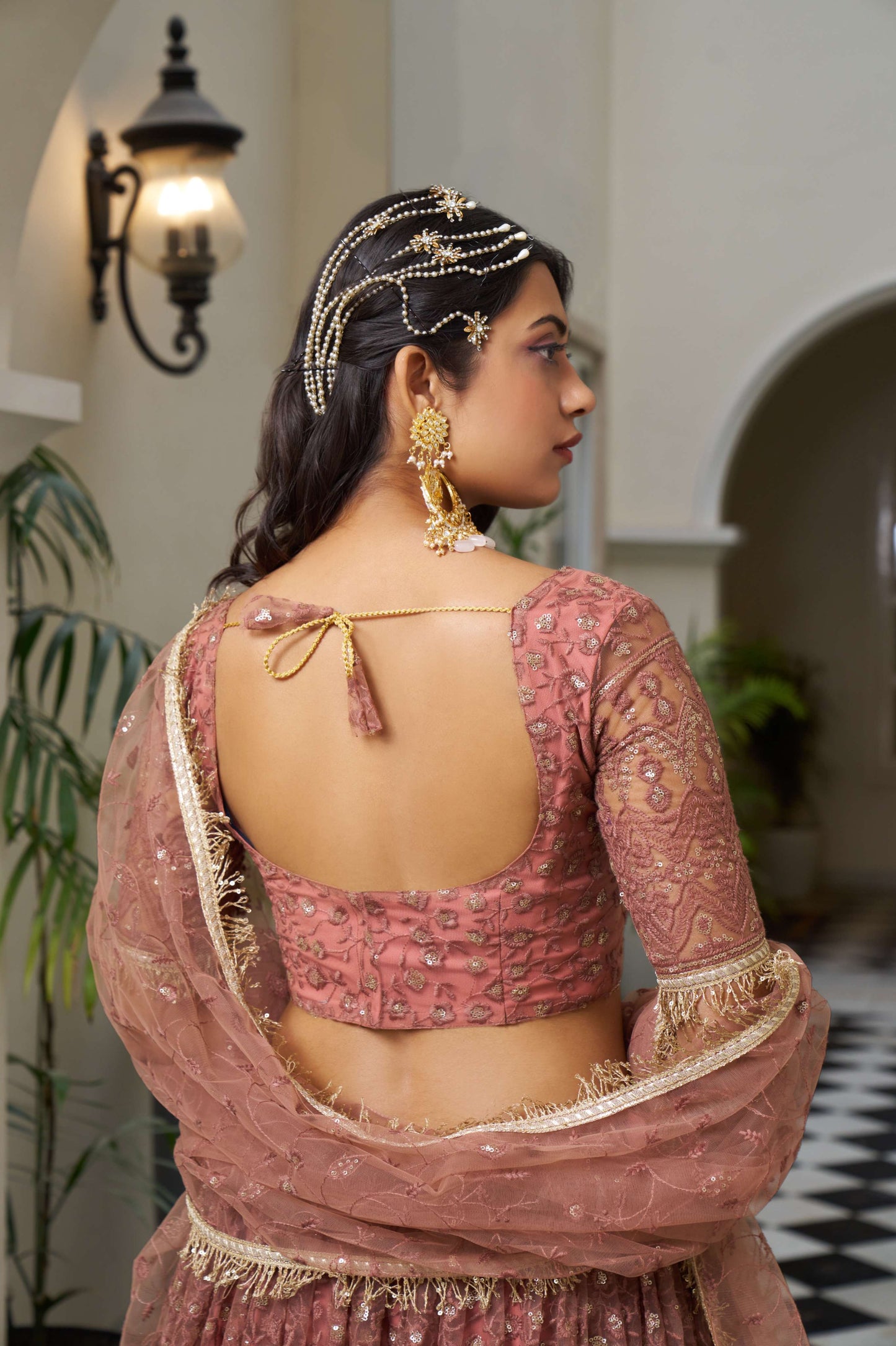 Rust Red Thread Embroidered Net Lehenga Choli