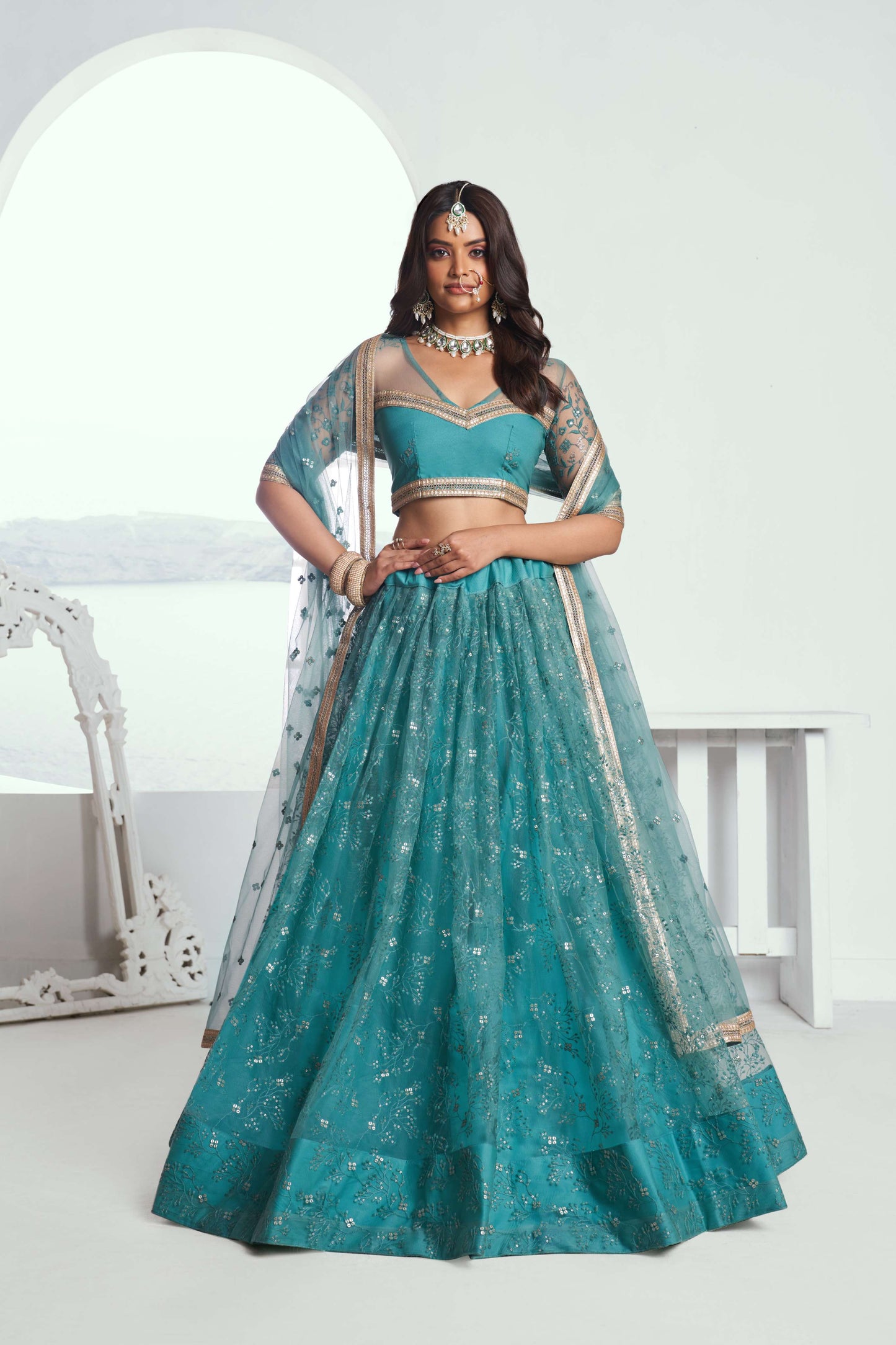 Turquoise Embroidered Net Lehenga Choli