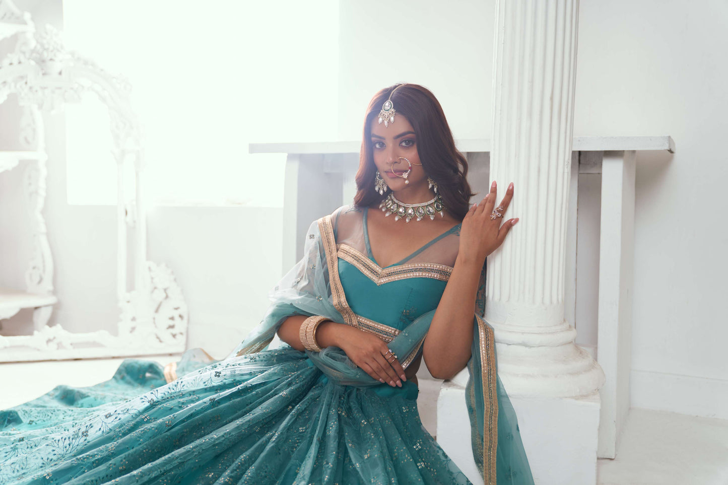 Turquoise Embroidered Net Lehenga Choli