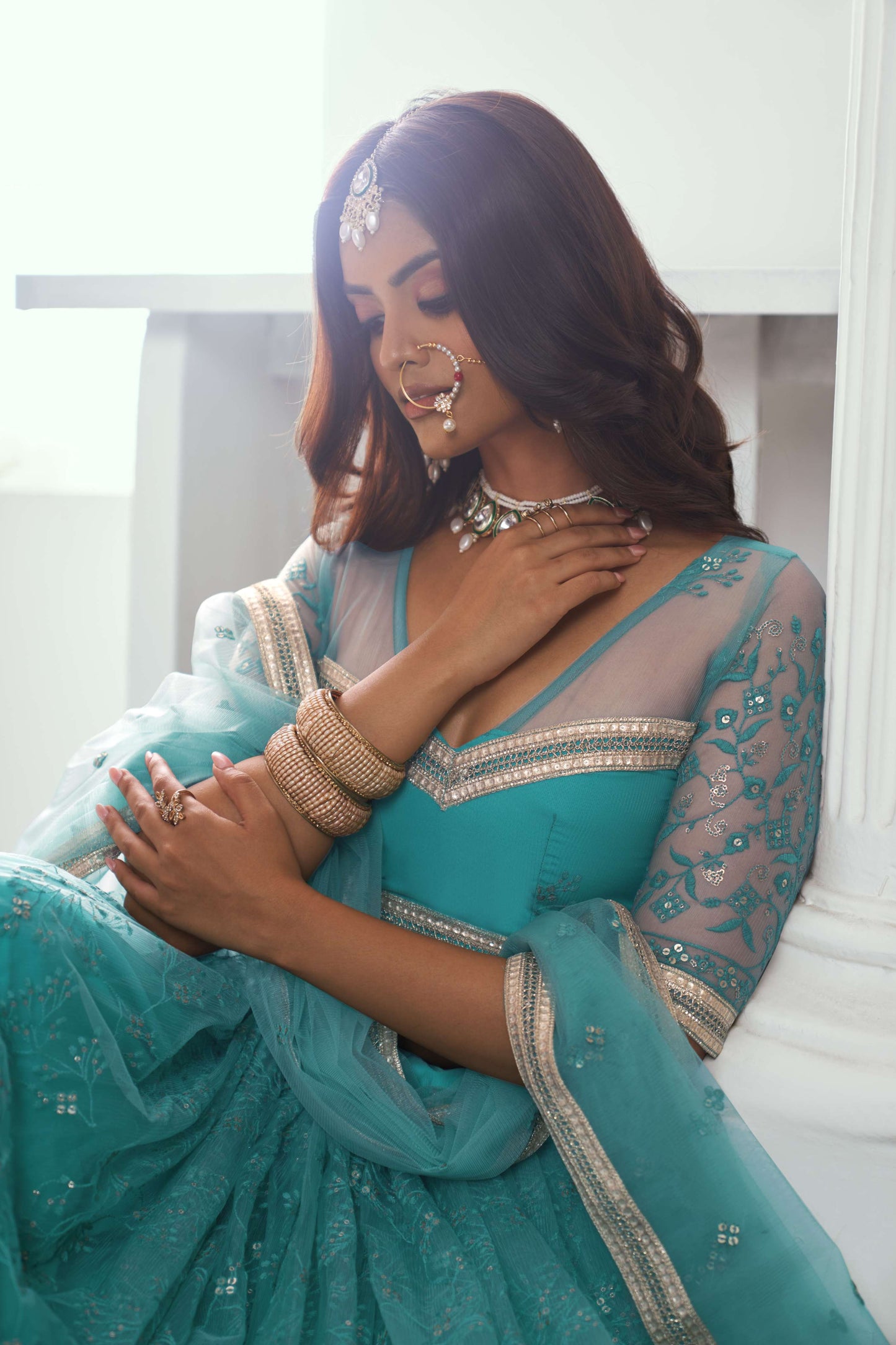 Turquoise Embroidered Net Lehenga Choli