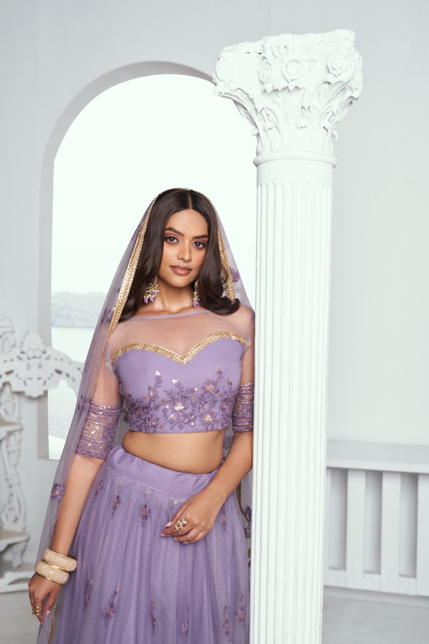 Lavender Embroidered Lehenga Choli in Net