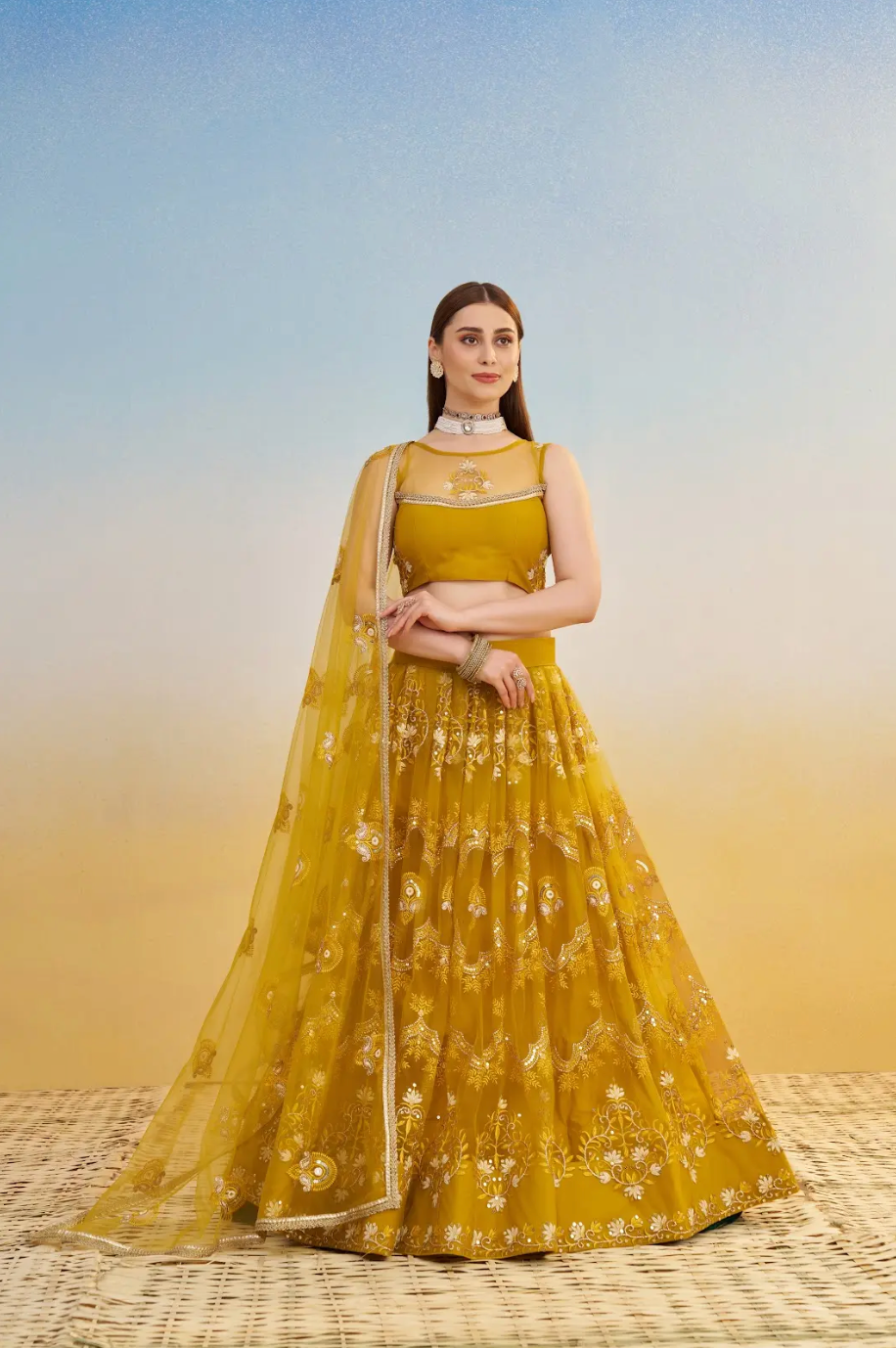 Yellow Net Lehenga Choli in Sequins Embroidery
