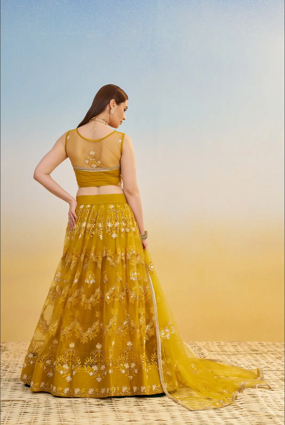 Yellow Net Lehenga Choli in Sequins Embroidery